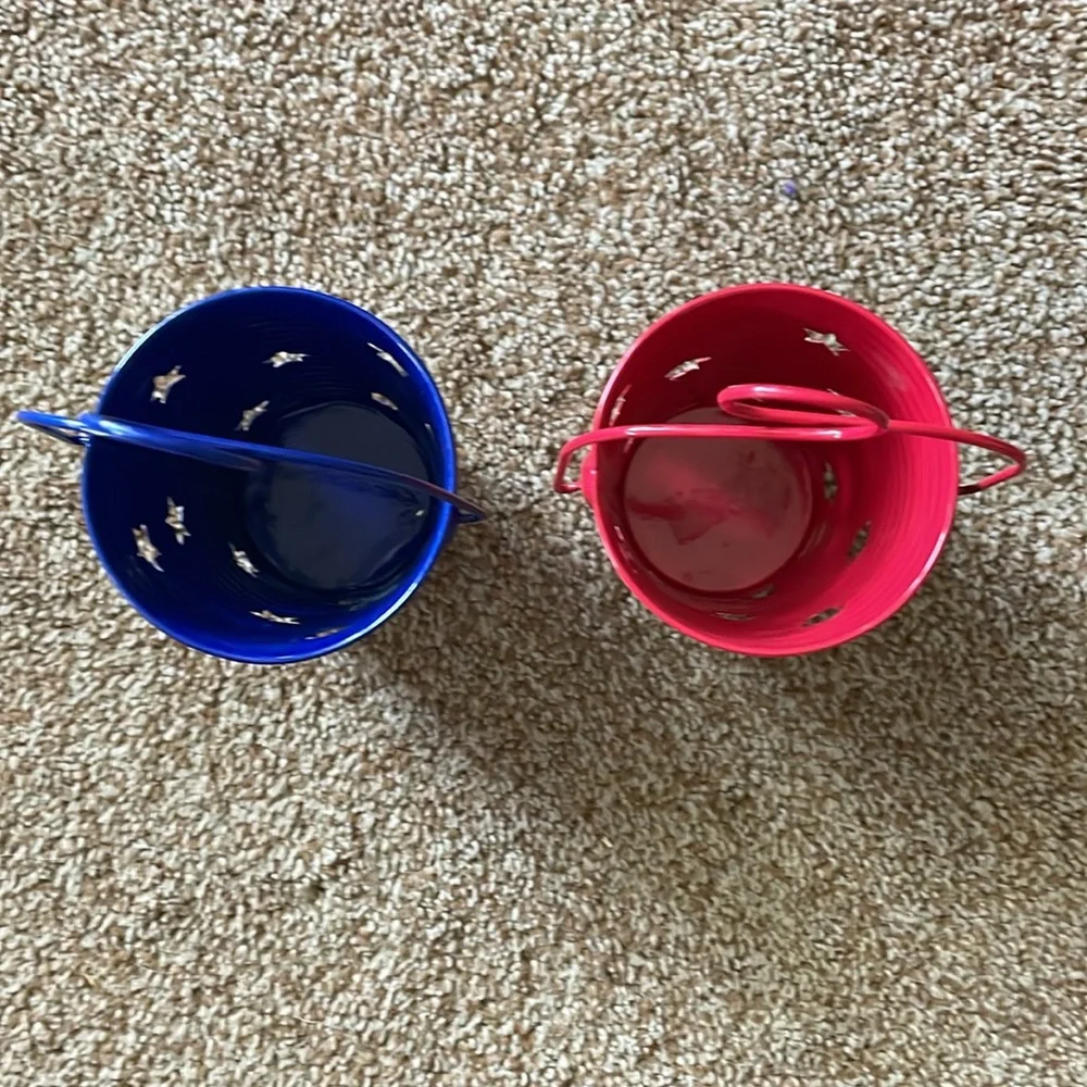 Red and Blue metal candle holders with star cut outs